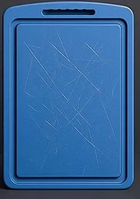 Illustrative plastic cutting board showing surface scratches